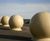 Recycled spherical bollards over The River Aire 2