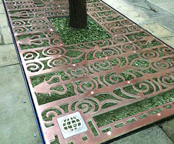 Bespoke decorative bronze tree grilles, NOMA development