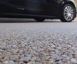 DekorGrip resin bound surfacing - Maserati dealership - on this page