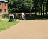 Porous resin bound surfacing for gin distillery grounds - on this page