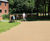 Porous resin bound surfacing for gin distillery grounds 0