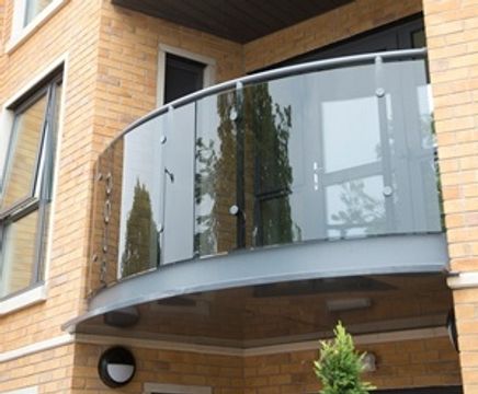 NEACO’s curved glass balconies featured at development