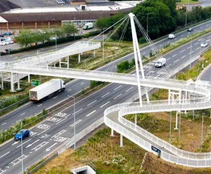 Steel cable stay footbridge over A45 at Rushden Lakes