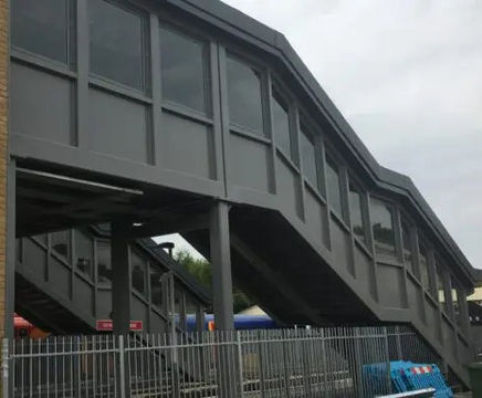 Fully enclosed pedestrian bridges