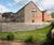 Timber retaining walls with fence extension for housing 0