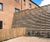 Timber retaining walls with fence extension for housing 2