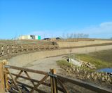 Two-tier gabion wall for housing development SuDS pond - on this page