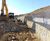 Two-tier gabion wall for housing development SuDS pond 1