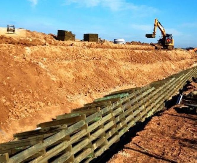 Retaining wall for production facility expansion