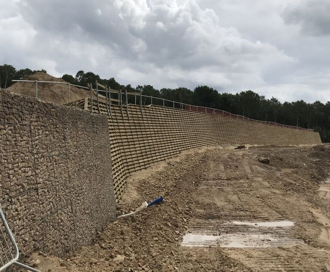 Timber crib and gabion basket retaining walls for quarry