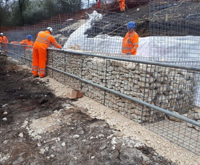 Gabion retaining walls stabilise railway embankment
