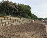 Timber crib retaining wall for new housing development - on this page