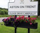 Welcome signs with planters