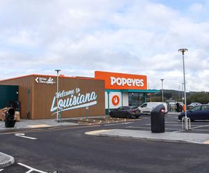 Bespoke open-front cycle shelter for new Popeyes restaurant in Nottingham