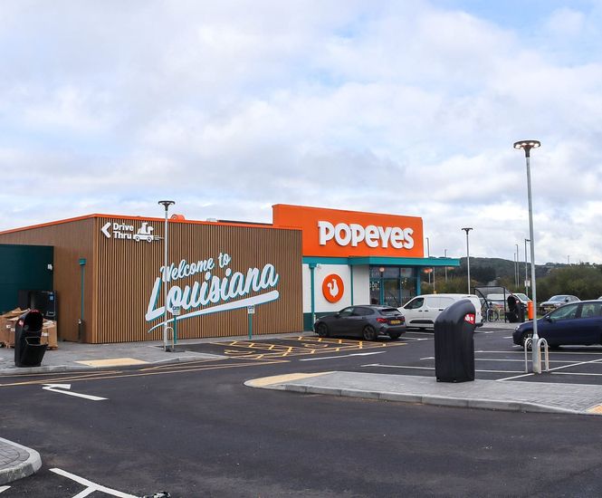 Bespoke open-front cycle shelter for new Popeyes restaurant in Nottingham