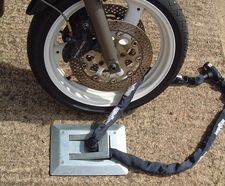 Motorcycle locking loop - bolt down