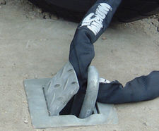Motorcycle locking loop - cast-in