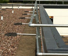 Discrete roof edge protection using radiused KeeGuard
