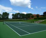 Artificial tennis court construction