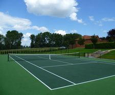 Artificial tennis court construction