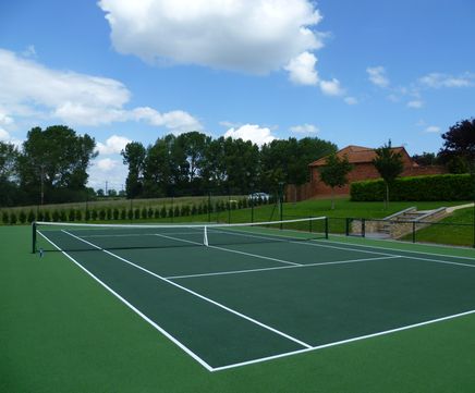 Artificial tennis court construction