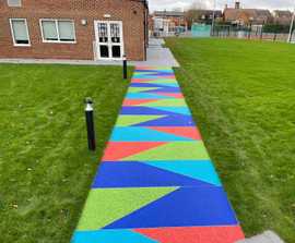 Recycled resin bound glass for accessible school pathways 