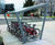 Edge - contemporary glass and stainless steel cycle shelter 11