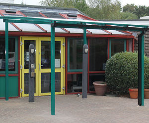 Entrance canopy and play area shelter for primary school