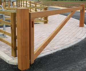 Hardwood timber boom-type swing gate