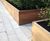 Hardwood seats and planters for green landscaping scheme 3