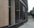 Bronze cladding and mesh fencing - supermarket car park 4