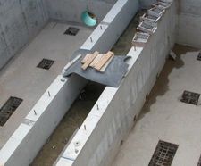 Corrugated and flat GRC permanent formwork 