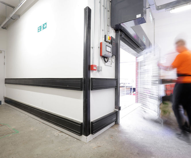 Service corridor wall protection for shopping centre