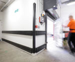 Service corridor wall protection for shopping centre