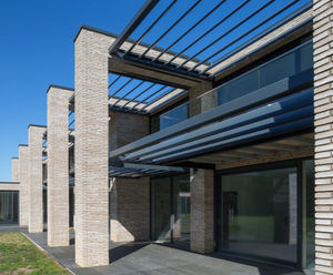 Solar shading system manages solar heat gain and glare