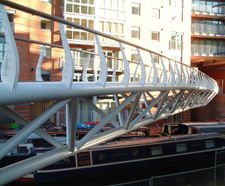Steel bridges including steel beam or truss bridge forms