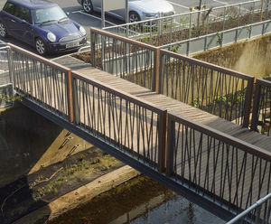 Bespoke steel and timber parapet bridge for Travelodge