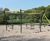 Hexagonal Swing - red steel playground swing set for public spaces 0