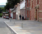 Granite pavement protection bollards