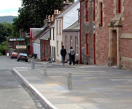 Granite pavement protection bollards