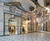 Sliding glass doors for elliptical glass link building 1