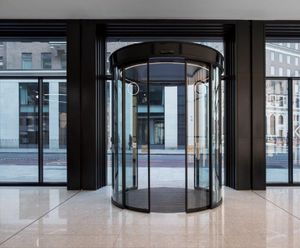 Automatic circular sliding doors for 1930's Art Deco building
