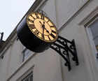 Replica ornate drum clock for company building exterior