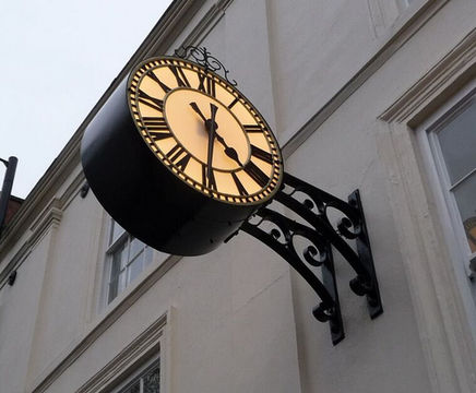 Replica ornate drum clock for company building exterior