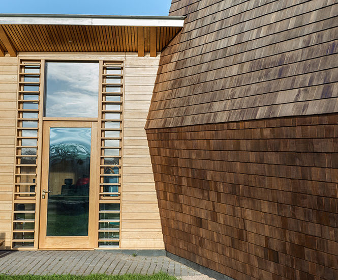 Natural cedar shingles for rural music therapy centre 