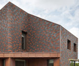 Single camber clay plain tiles for zero carbon house - on this page
