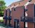 Clay tiles for roof and facade of apartment block - Lithuania 0
