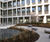 Polished concrete pebble seats for office landscaping 0