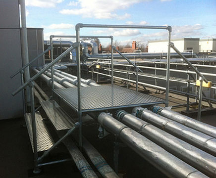 Bespoke safe access platforms and step-overs