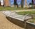 Shoreline SL007 curved stainless steel and timber bench 1